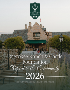 Cherokee Ranch & Castle viewed from the front courtyard at sunset, introducing the Cherokee Ranch & Castle Foundation 2026 Report to the Community.